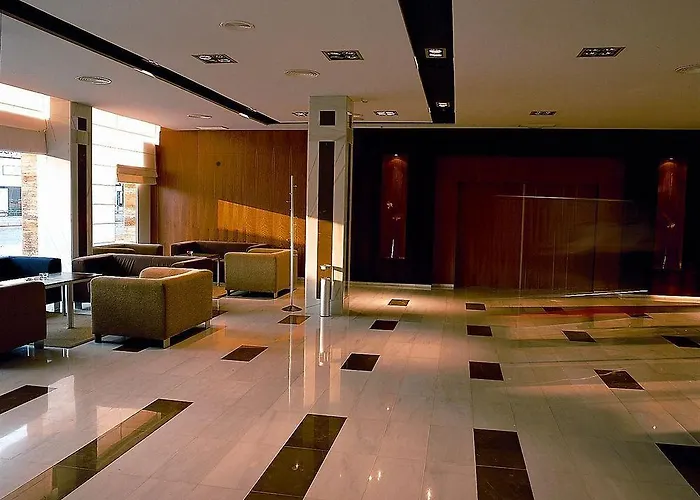 Отель Exe Ciudad De