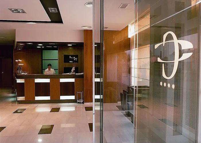 Отель Exe Ciudad De 4*